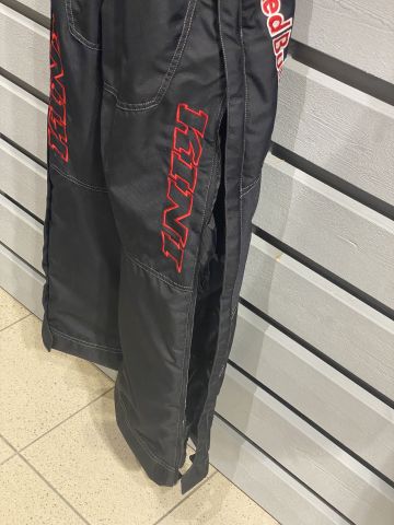 745368-13 Lot - Snowmobile rack - about 120 items - KINI / Red bull