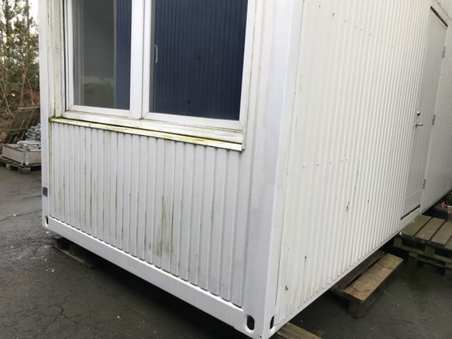 758861-11 Staff shed with sheet metal facade