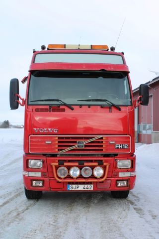 765576-8 Roll barrel changer with hook arm Volvo FH12-37 8X4 1999 414 hp