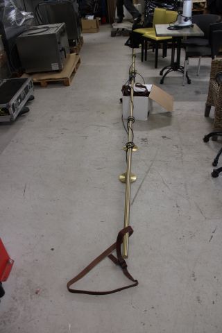 769298-6 Ceiling lamp Rubn 400cm in brass and leather. Design by Niclas Hoflin