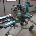 771256-1 Cutting & Miter saw Makita LS1016L with folding table.