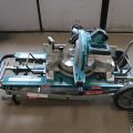 771256-2 Cutting & Miter saw Makita LS1016L with folding table.