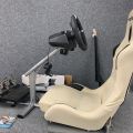 768968-1 Racing game chair with Logitech G920 steering wheel and pedal