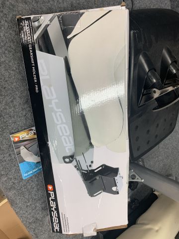 768968-7 Racing game chair with Logitech G920 steering wheel and pedal