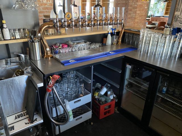 744841-10 Bar counter at an angle of approx. 407x250 cm - as well as back bar shelves and accessories