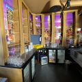 744841-12 Bar counter at an angle of approx. 407x250 cm - as well as back bar shelves and accessories