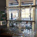 744841-20 Bar counter at an angle of approx. 407x250 cm - as well as back bar shelves and accessories