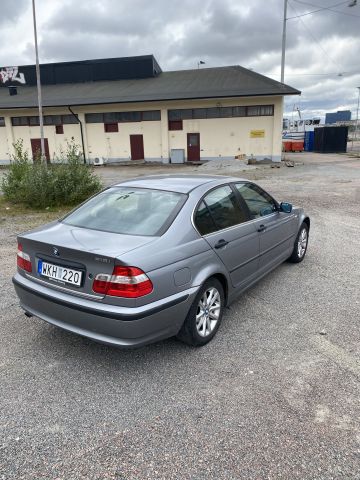 826570-5 BMW 318i sedan - 2004