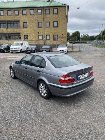 826570-7 BMW 318i sedan - 2004