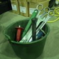 832819-2 Perforated bucket with various hand tools