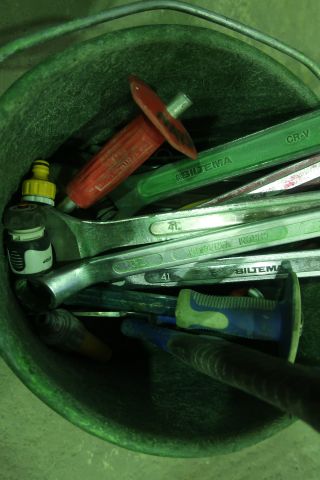 832819-5 Perforated bucket with various hand tools