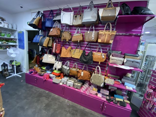 805988-10 Shop fittings, wall shelves, about 35 sections