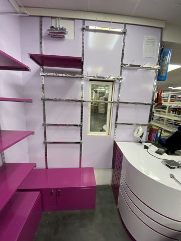805988-23 Shop fittings, wall shelves, about 35 sections