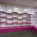 805988-25 Shop fittings, wall shelves, about 35 sections