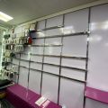 805988-28 Shop fittings, wall shelves, about 35 sections