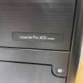 848061-9 Two printers, HP Laserjet P3015 and Pro 400