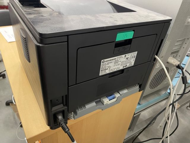 848061-11 Two printers, HP Laserjet P3015 and Pro 400