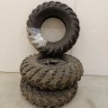 754197-1 3 ATV tires, of which 2 on rim, Carlisle Badlands A / R 26x8,00R12 NHS