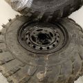 754197-3 3 ATV tires, of which 2 on rim, Carlisle Badlands A / R 26x8,00R12 NHS