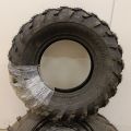 754197-4 3 ATV tires, of which 2 on rim, Carlisle Badlands A / R 26x8,00R12 NHS