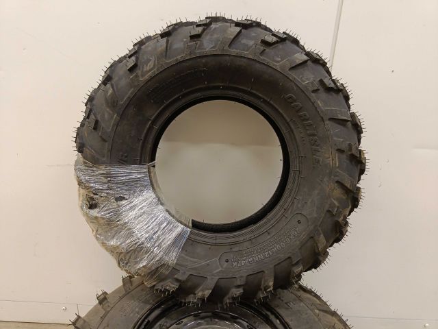 754197-4 3 ATV tires, of which 2 on rim, Carlisle Badlands A / R 26x8,00R12 NHS