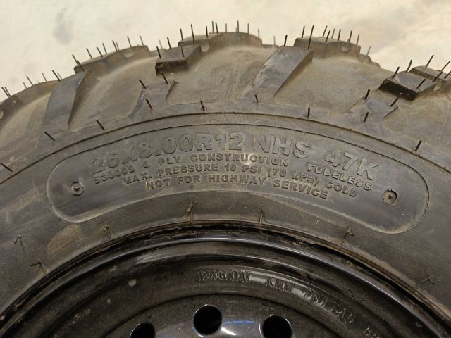 754197-8 3 ATV tires, of which 2 on rim, Carlisle Badlands A / R 26x8,00R12 NHS