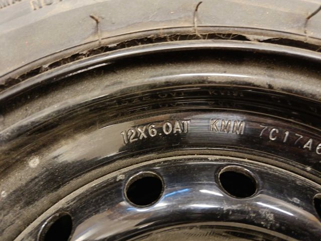 754197-9 3 ATV tires, of which 2 on rim, Carlisle Badlands A / R 26x8,00R12 NHS