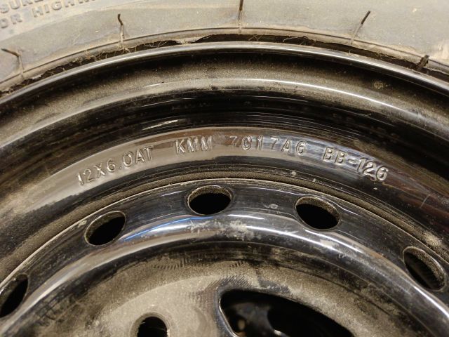 754197-10 3 ATV tires, of which 2 on rim, Carlisle Badlands A / R 26x8,00R12 NHS