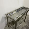 860108-2 Dispensing bench with rollers right / left, grille lower shelf. About 170x60x90cm