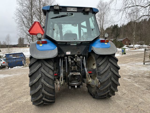 869960-6 New Holland TS 110 with front loader RAZ400