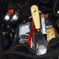683437-5 Tool bag with spirit level, hammer, crowbar, axe etc.