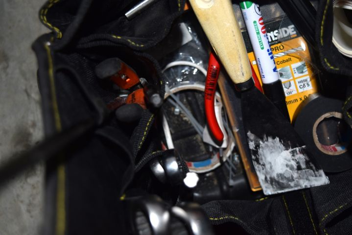 683437-6 Tool bag with spirit level, hammer, crowbar, axe etc.