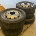 824564-1 6 studded C-tires on rim, Nissan Cabstar