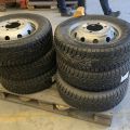 824564-7 6 studded C-tires on rim, Nissan Cabstar