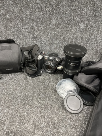 923997-1 Older digital camera Canon Powershot S3 + accessories