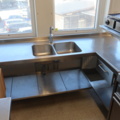925313-1 L-shaped stainless steel bench with hob and mixer