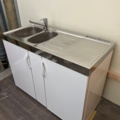 930522-4 Kitchen bench with sink cupboard and fridge-freezer