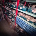 921201-15 Shelves with spare parts for older Citroën 60s-90s, as well as spare parts, oils, exhaust pipes