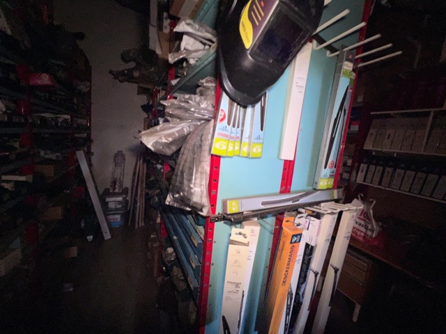 921201-17 Shelves with spare parts for older Citroën 60s-90s, as well as spare parts, oils, exhaust pipes