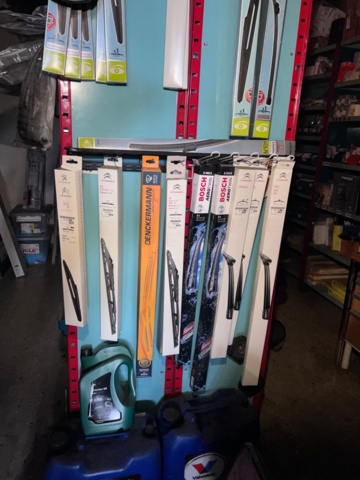 921201-39 Shelves with spare parts for older Citroën 60s-90s, as well as spare parts, oils, exhaust pipes