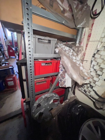 921201-41 Shelves with spare parts for older Citroën 60s-90s, as well as spare parts, oils, exhaust pipes