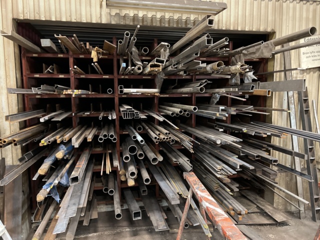 Compartment storage rack with metal material, pipes/profiles etc ...