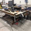 946094-1 Scissor lift table with bench grinder and vise
