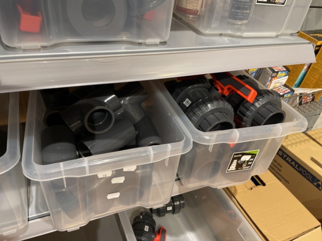 946701-24 17 sections of shelves with pool items