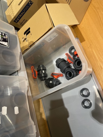 946701-25 17 sections of shelves with pool items