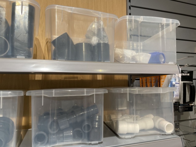 946701-26 17 sections of shelves with pool items