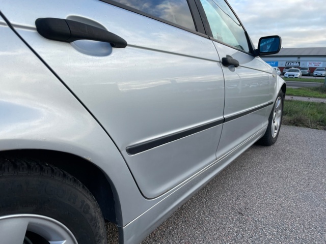 970087-21 BMW 316i - 2000