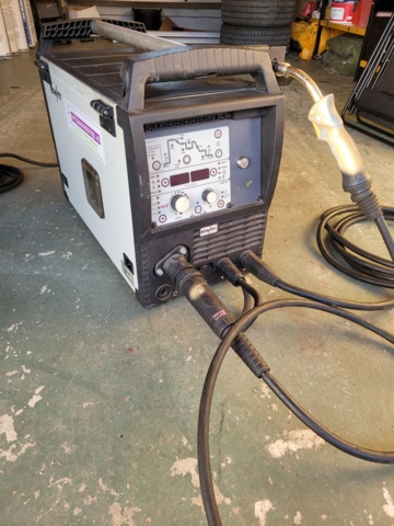 947409-1 MIG/MAG welding EWM Phoenix 335 Progress pulse TKM including hose package and ground cable.