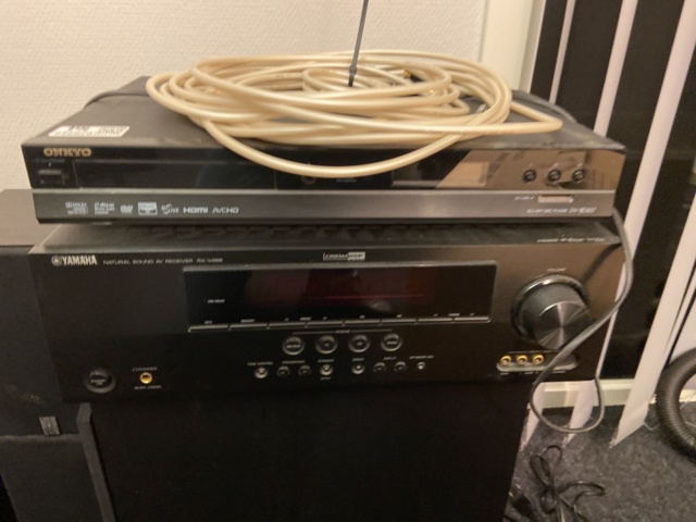 946526-2 Receiver, subwoofer, blu-ray, and 4 speakers