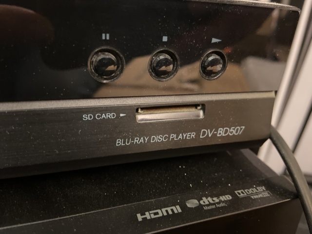 946526-5 Receiver, subwoofer, blu-ray, and 4 speakers